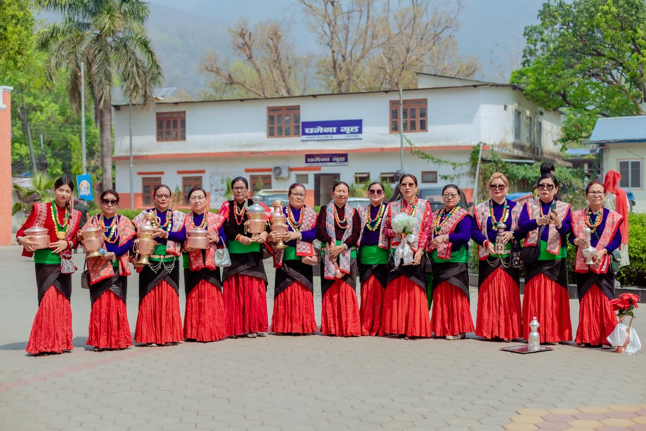Crafting Captivating Headlines: Your awesome post title goes here Group of Nepali women in vibrant traditional attire performing a cultural ceremony in Butwal.
